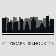 Naklejka premium The city skyline. Silhouettes of buildings. Vector on a gray background 