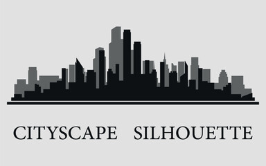 Fototapeta premium The city skyline. Silhouettes of buildings. Vector on a gray background 