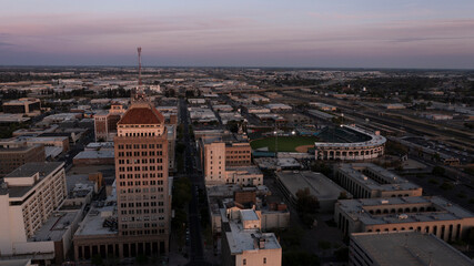 Fresno, California, USA - April 18, 2023: Sunset light shines on the historic downtown Fresno skyline.