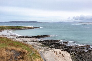 Aerial view of the Inishkeel island during a misty and hazy winter day - Portnoo, County Donegal, Ireland