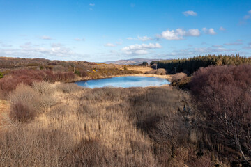 Aerial of lake in a peatbog by Clooney, Portnoo - County Donegal, Ireland.