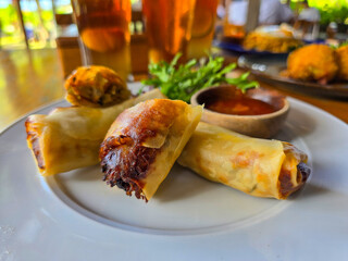 Fried spring rolls and sauces