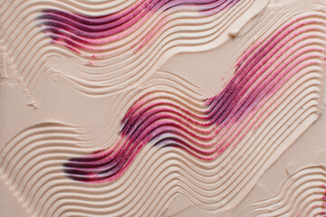 Top view of pink and cream buttercream for decorating cake, silky smooth american buttercream with...