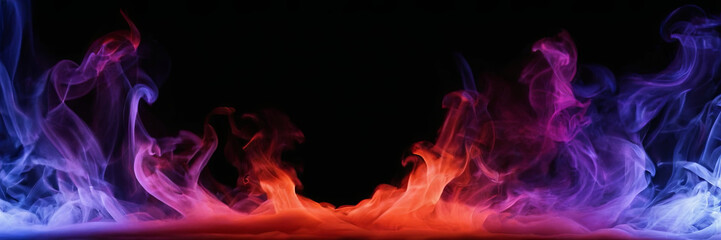 Fototapeta premium Colorful smoke swirls in blue, purple, and red dance against a black background, creating a mesmerizing display of vibrant hues