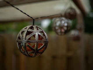 Metallic round garden lights in daylight