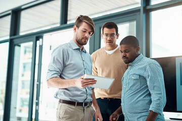 Tablet, business men and planning for meeting with app developer project with design ideas in office. Brainstorming, tech and teamwork of employee with digital collaboration for homepage layout talk