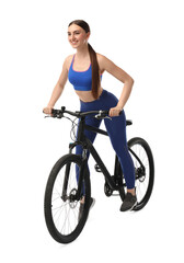 Obraz premium Smiling woman riding bicycle on white background
