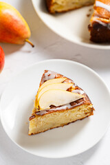 Pear pie. Homemade cake. Fruit dessert on a plate. 