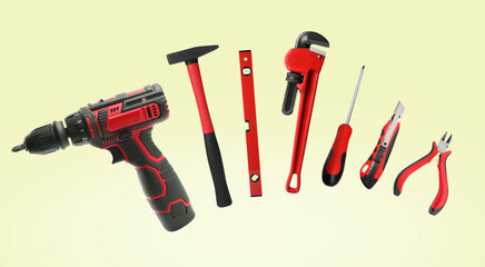 Set of different construction tools on light background