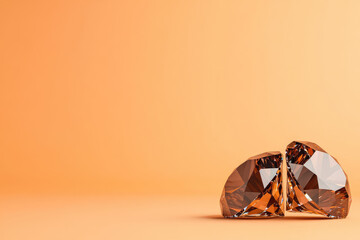 Shimmering Brown Diamonds, two intricately cut brown diamonds reflect light against a warm orange backdrop, showcasing their stunning facets and rich color.