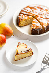 Pear pie. Homemade cake. Fruit dessert on a plate. 