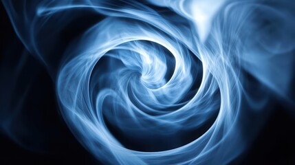 Obraz premium An abstract swirl of blue smoke creating a mesmerizing vortex effect on a dark background, perfect for artistic projects.