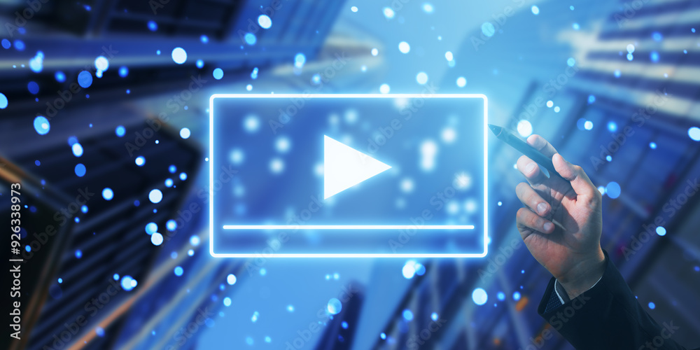 Poster Hand pressing play button icon on blurred blue background with bokeh dots.
