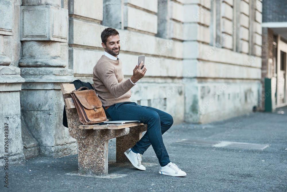 Poster businessman, sidewalk and smile with smartphone on bench with mobile app for ehailing cab in new yor
