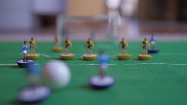 playing  classic table football game 4k