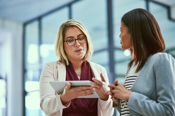 Advice, discussion and women in business with tablet, opinion or team with project management...