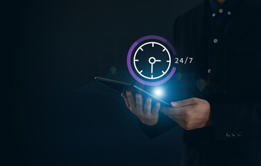  hand holding virtual 24-7 with clock on hand for worldwide nonstop and full-time available contact of service concept. customer service, nonstop service concept.