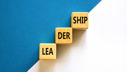 Leadership symbol. Concept word Leadership on beautiful wooden blocks. Beautiful white and blue...
