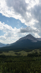 Canadian rocky Mountains nature background. Cloudy Summer day.