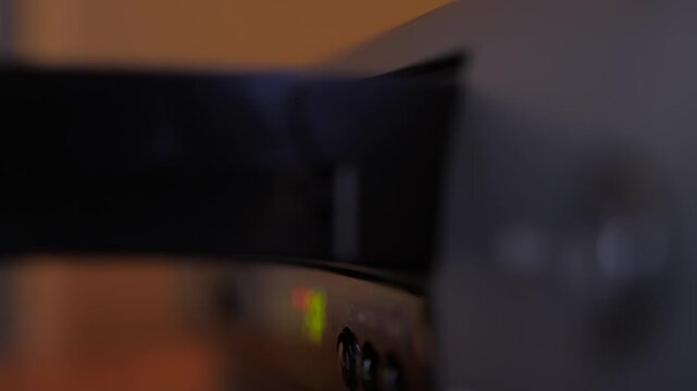 insert video vhs cassette into video recorder 4k