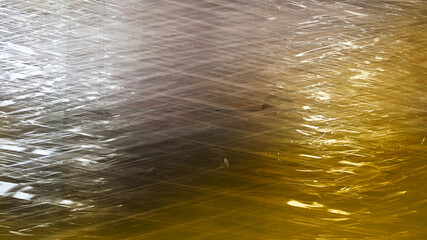 Cartons package wrapped in stretch film foil for transportation on pallets. Shipment of goods. Background. 