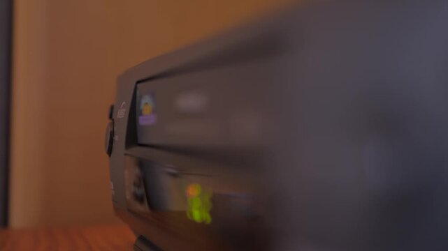 injecting remove video vhs cassette into video recorder 4k