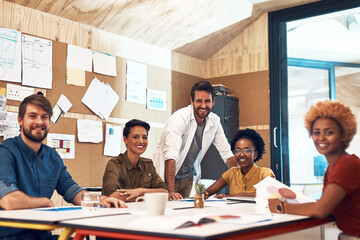 Business people, portrait and meeting with documents in office for graphic design, internship and training. Happy, employees and manager with paper on desk for development, workshop and project plan