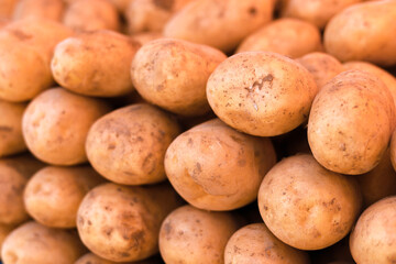 Young fresh potatoes on a bazaar counter