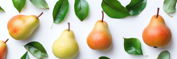 Obraz premium Close up ripe pears and leaves on a white background. Pear fruit texture