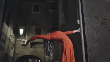 Elegant Fashion Model Posing in Urban Night Setting