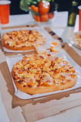 Group of young friends eating pizza.Home party.