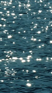 Slow motion of blurred sea surface at sunset. Calm soothing waters.