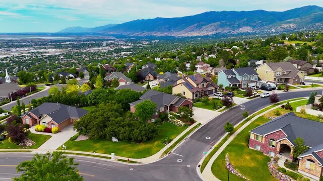North Salt Lake, luxurious houses with greenery and paved roads in Utah on a sunny day