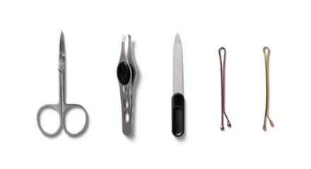 A selection of grooming tools is displayed, including scissors, tweezers, a nail file, and hairpins, all neatly arranged on a white surface