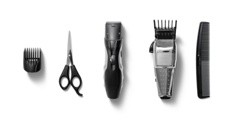 Various grooming tools are neatly arranged, showcasing scissors, a hair trimmer, clipper, and comb for hair cutting and styling