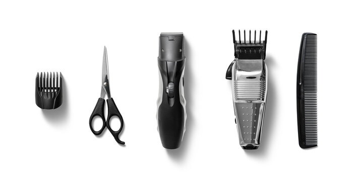 Various grooming tools are neatly arranged, showcasing scissors, a hair trimmer, clipper, and comb for hair cutting and styling