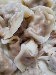 Full screen close up of boiled dumplings
