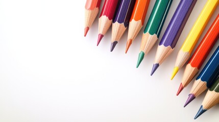 Fototapeta premium Business plan sketch with colorful pencils neatly arranged on a clean white background, symbolizing creativity, planning, and design.