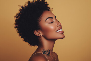 A close up of a tattooed black woman's face with her eyes closed