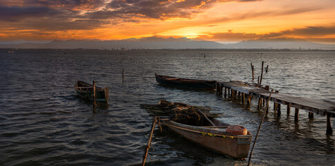Fototapeta premium boats at sunset