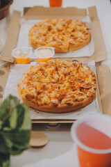Group of young friends eating pizza.Home party.