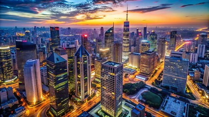 Fototapeta premium Aerial view of a bustling cityscape at dusk, with neon lights and skyscrapers symbolizing financial districts and corporate power.