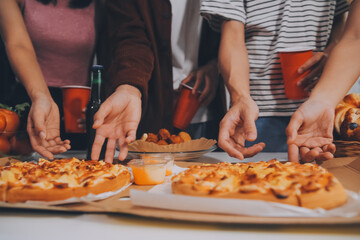 Group of young friends eating pizza.Home party.