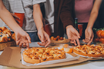 Group of young friends eating pizza.Home party.