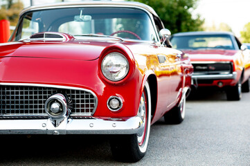 Vintage cars on display at classic automotive exhibition.