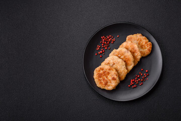 Delicious fresh fried minced fish cutlets with spices and herbs