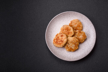 Delicious fresh fried minced fish cutlets with spices and herbs