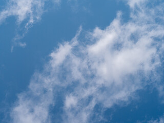white clouds on a blue sky background