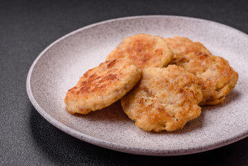 Delicious fresh fried minced fish cutlets with spices and herbs