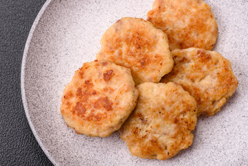 Delicious fresh fried minced fish cutlets with spices and herbs